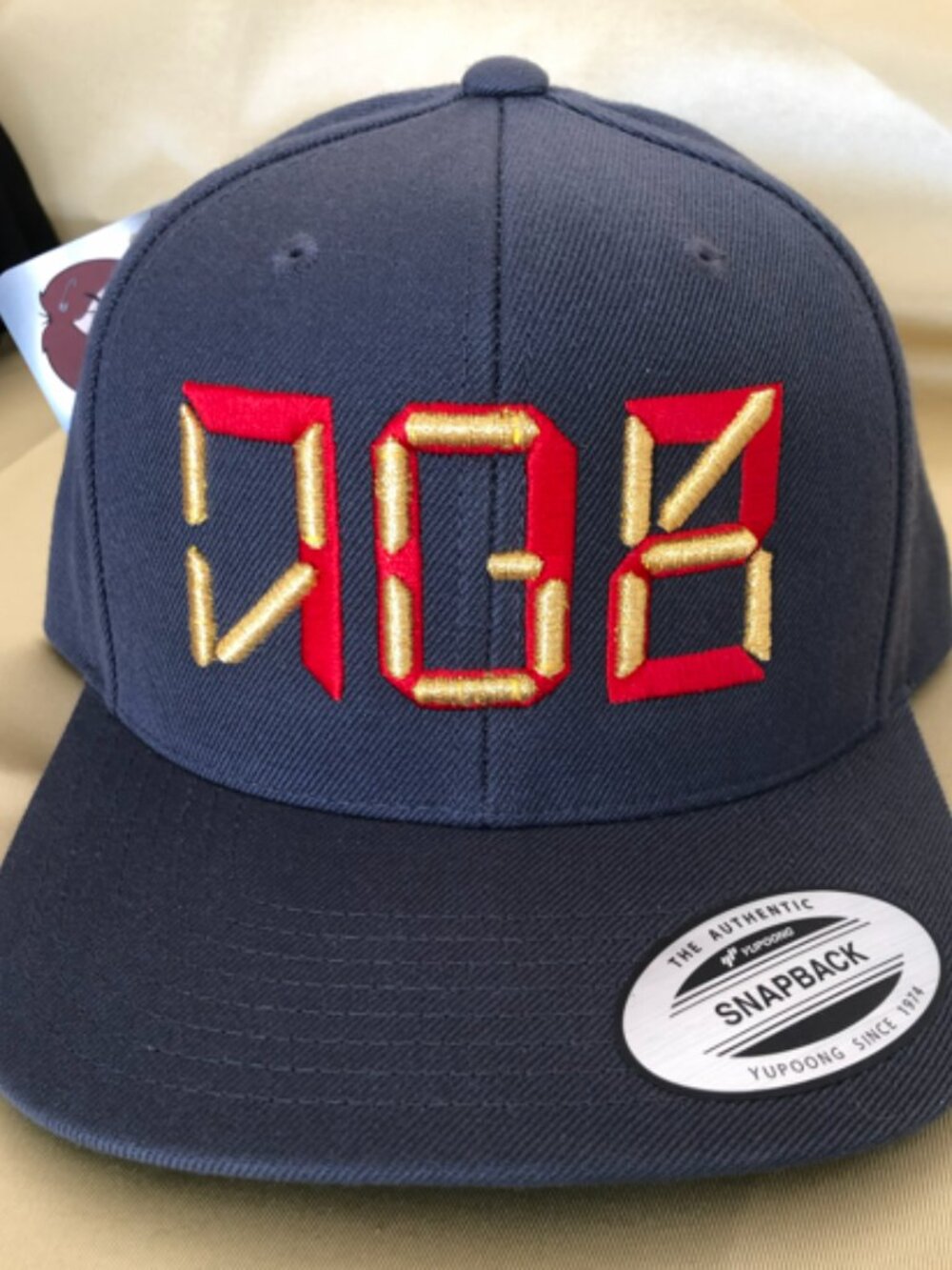 VGK 702 Dark Grey with Red/Gold Thread Snapback Hats!